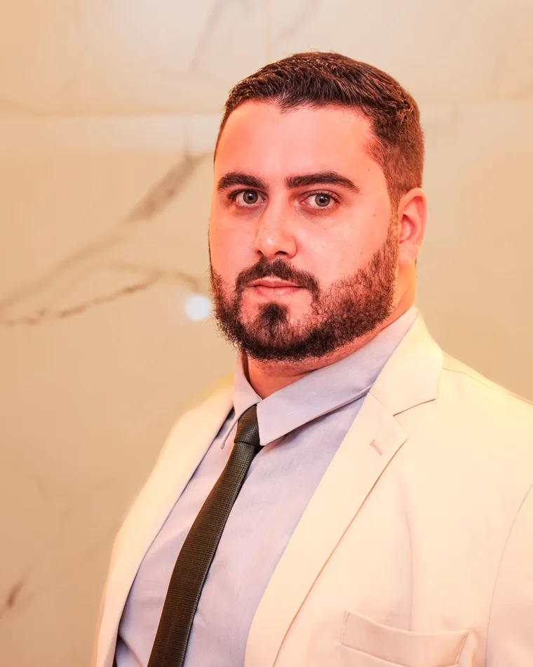 Retrato do Dr. Bruno Monhaler Duarte, advogado de franquias
